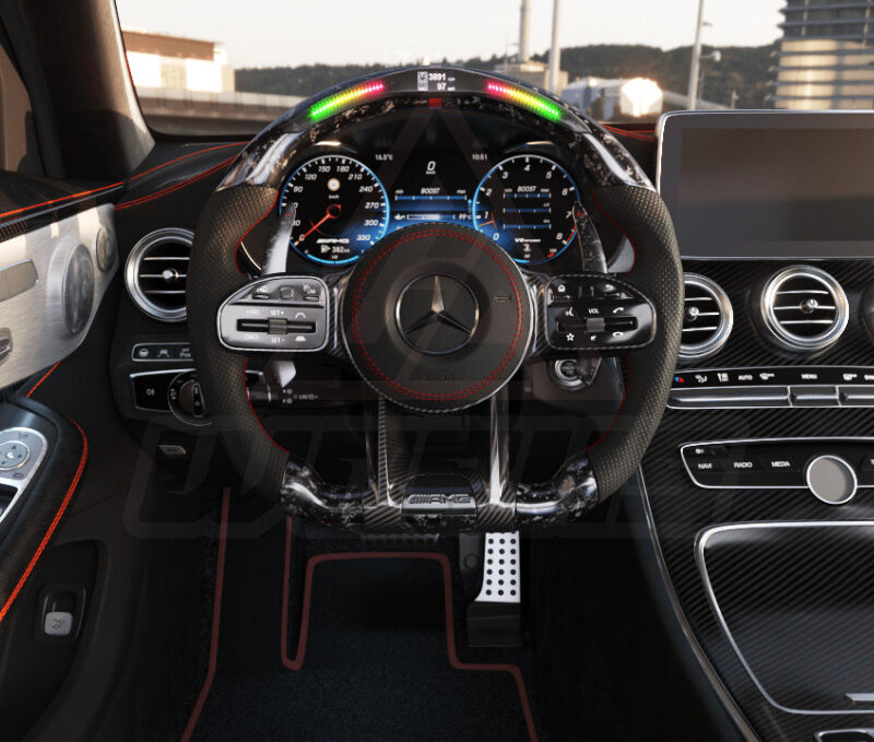 Front view of a year 2019 generation mercedes amg retrofit steering wheel in forged carbon fiber, leather, piano black buttons, red accents, extended paddle shifters and led shift lights